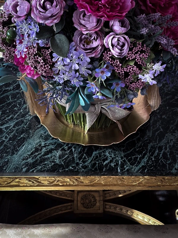 Flowers in a vase on a marble table